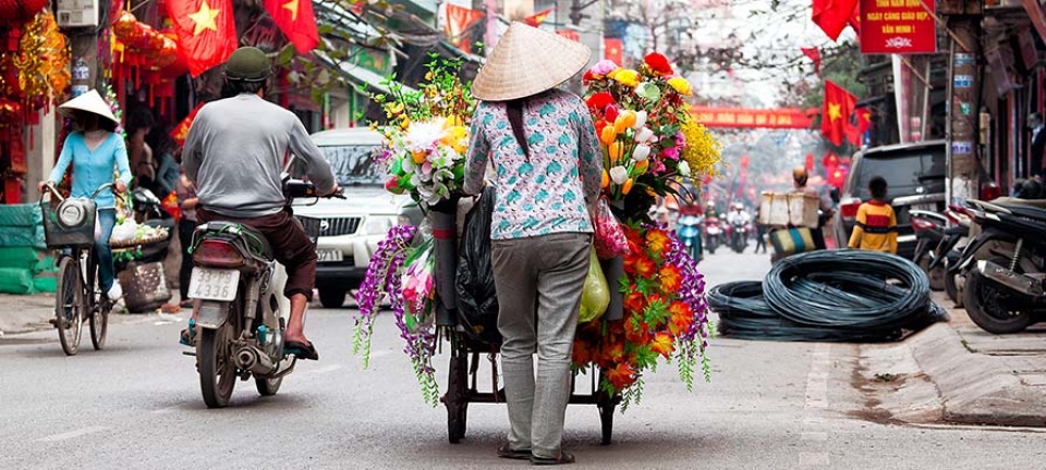 Donna vietnamita fotografata durante il tour di gruppo di 11 giorni